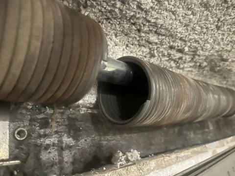 Ressort de torsion cassé sur une porte sectionnelle